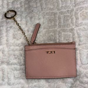 Women’s pink Tumi card holder